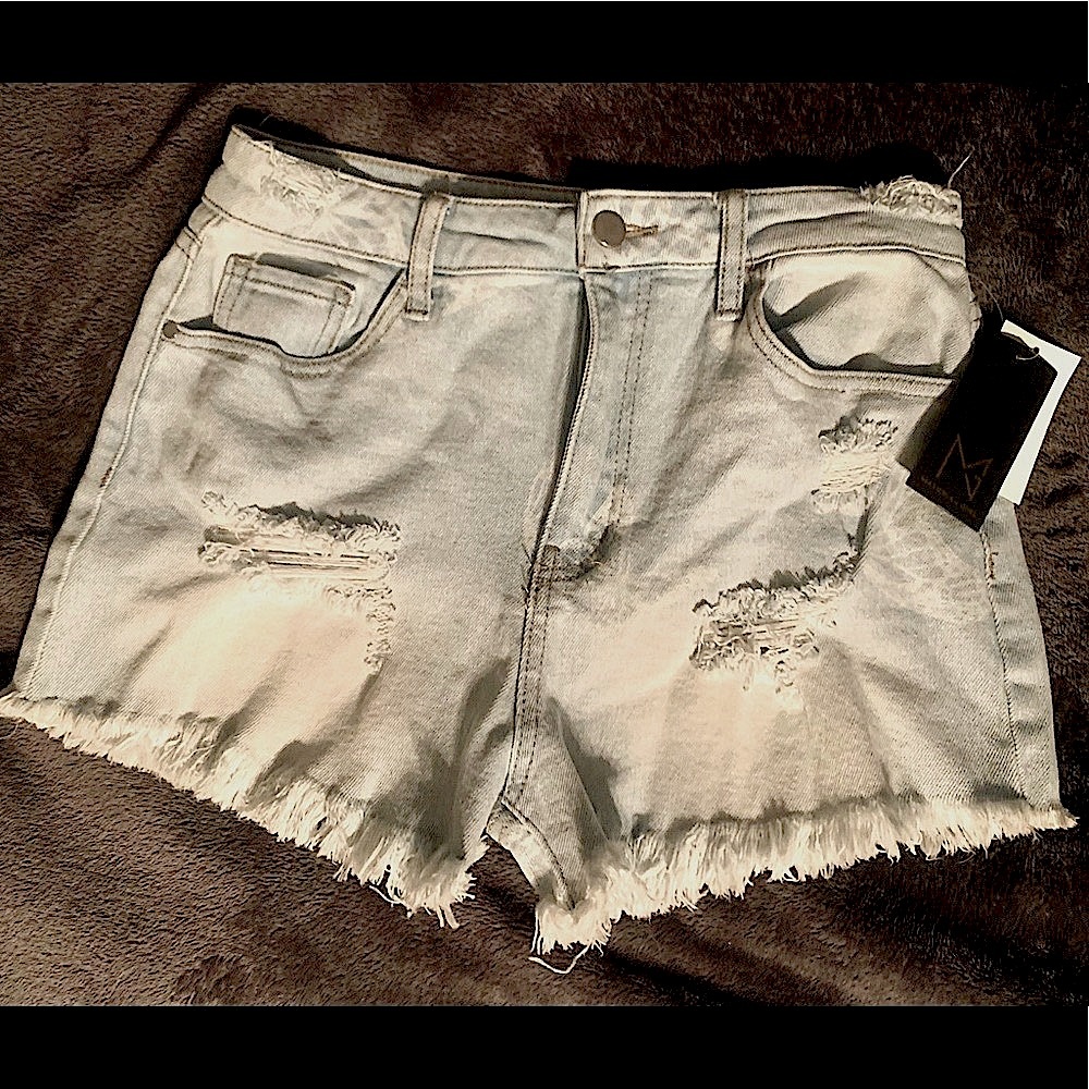 Material Girl Jean Shorts with a few butterfly outlines, new, never worn Size 9